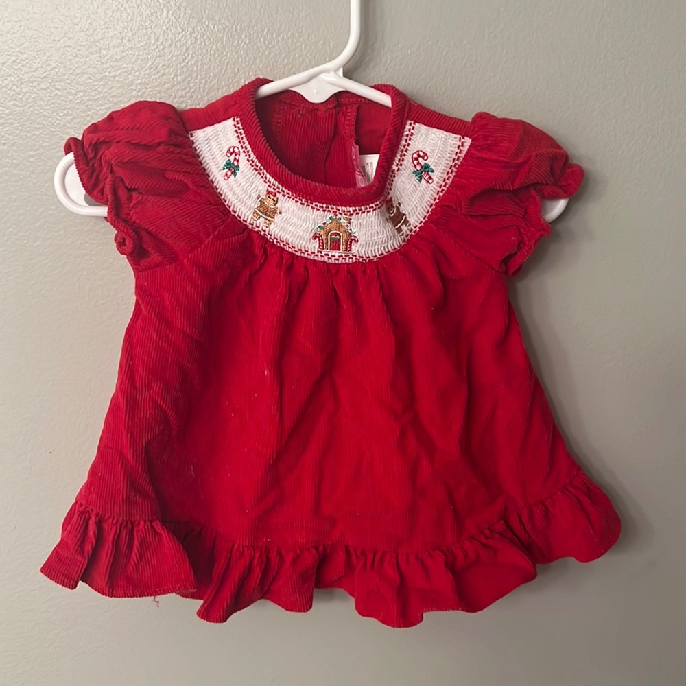 6months red holiday dress with detailed stitching and ruffle sleeves